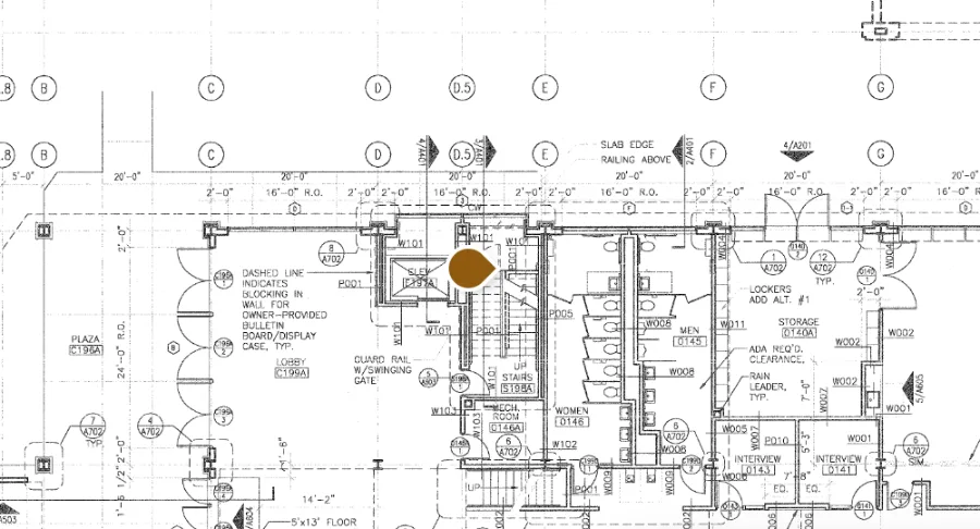A pin placed on a scanned architectural plan in the Oriel drawing viewer